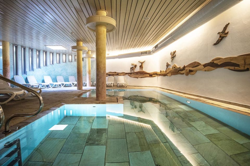Indoor pool, open 10:00 AM to 9:00 PM, sun loungers