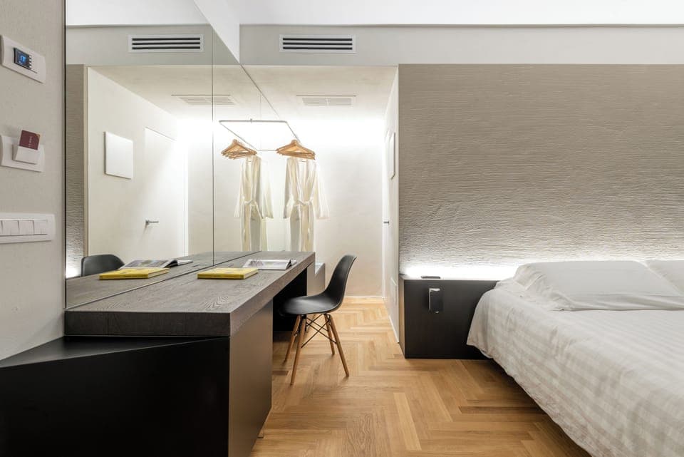 Premium bedding, down comforters, pillowtop beds, minibar