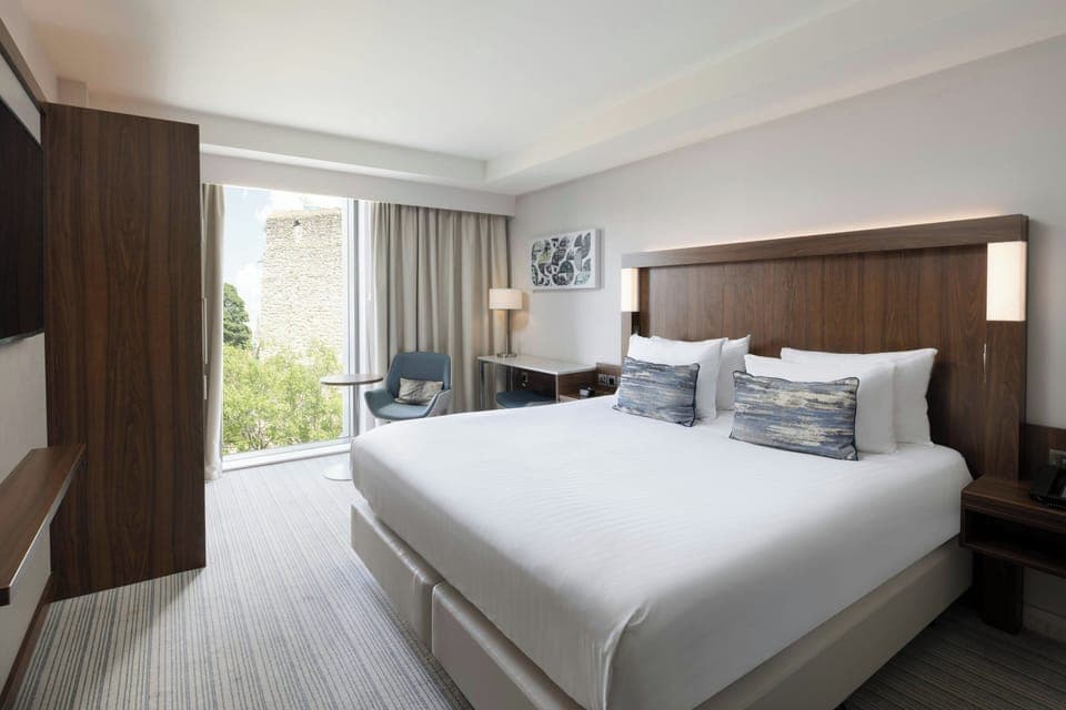 Premium Room, 1 King Bed (View) | Pillowtop beds, in-room safe, desk, laptop workspace