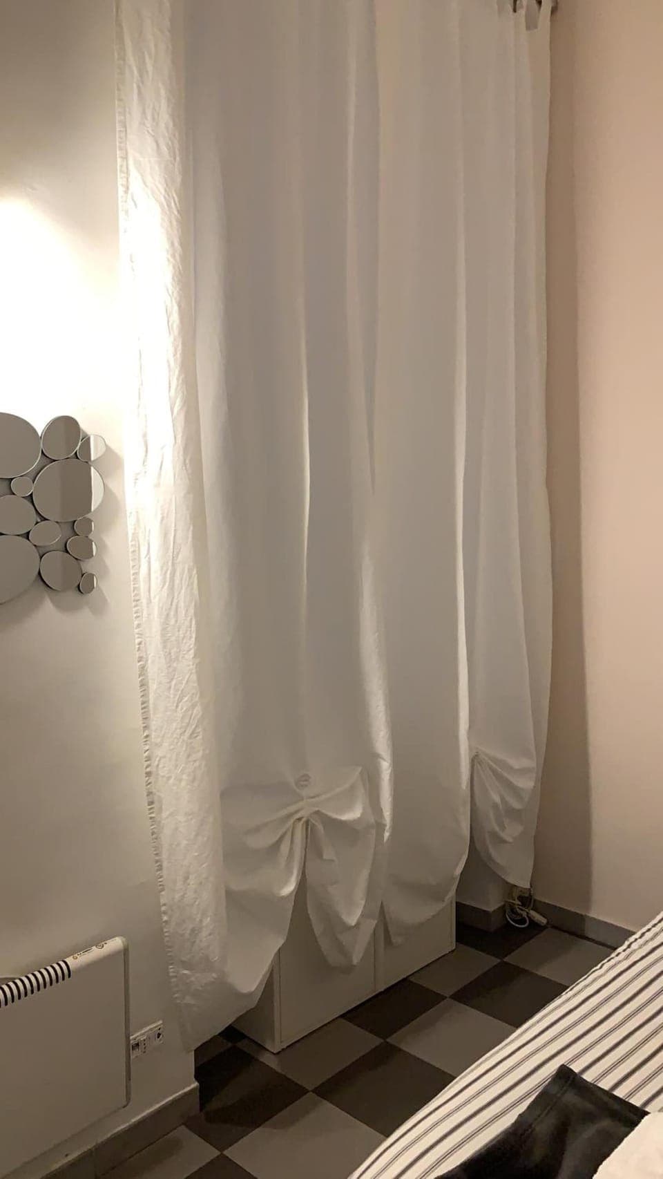 Down comforters, blackout drapes, free WiFi, bed sheets