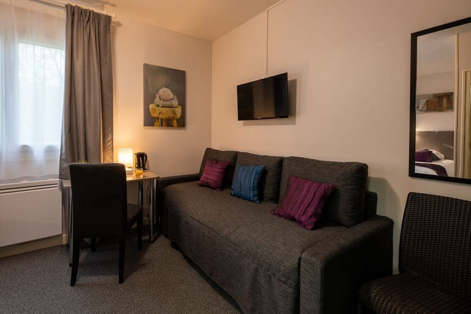 Superior Family Room | Desk, blackout drapes, iron/ironing board, free cribs/infant beds