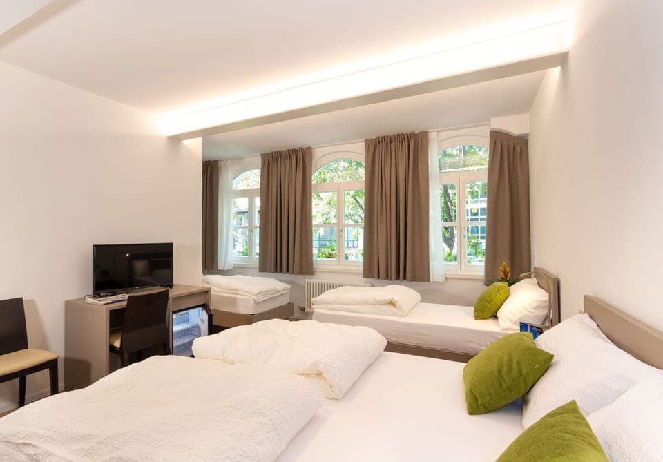 Family Room | Minibar, individually furnished, desk, laptop workspace