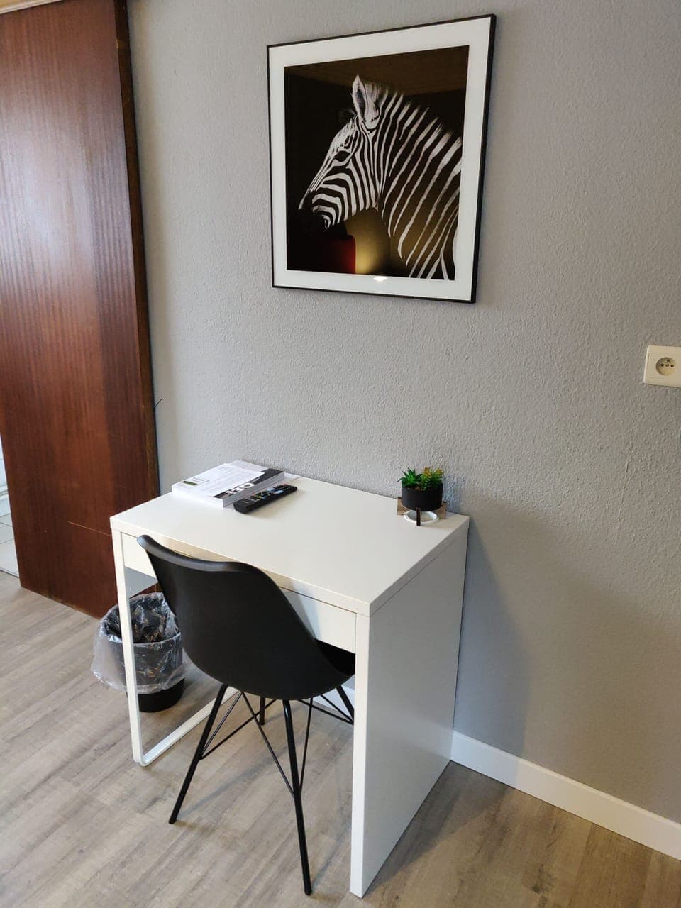 Desk, laptop workspace, blackout drapes, iron/ironing board