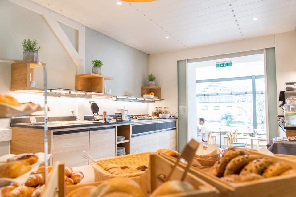 Breakfast, lunch, dinner served; local cuisine, alfresco dining 