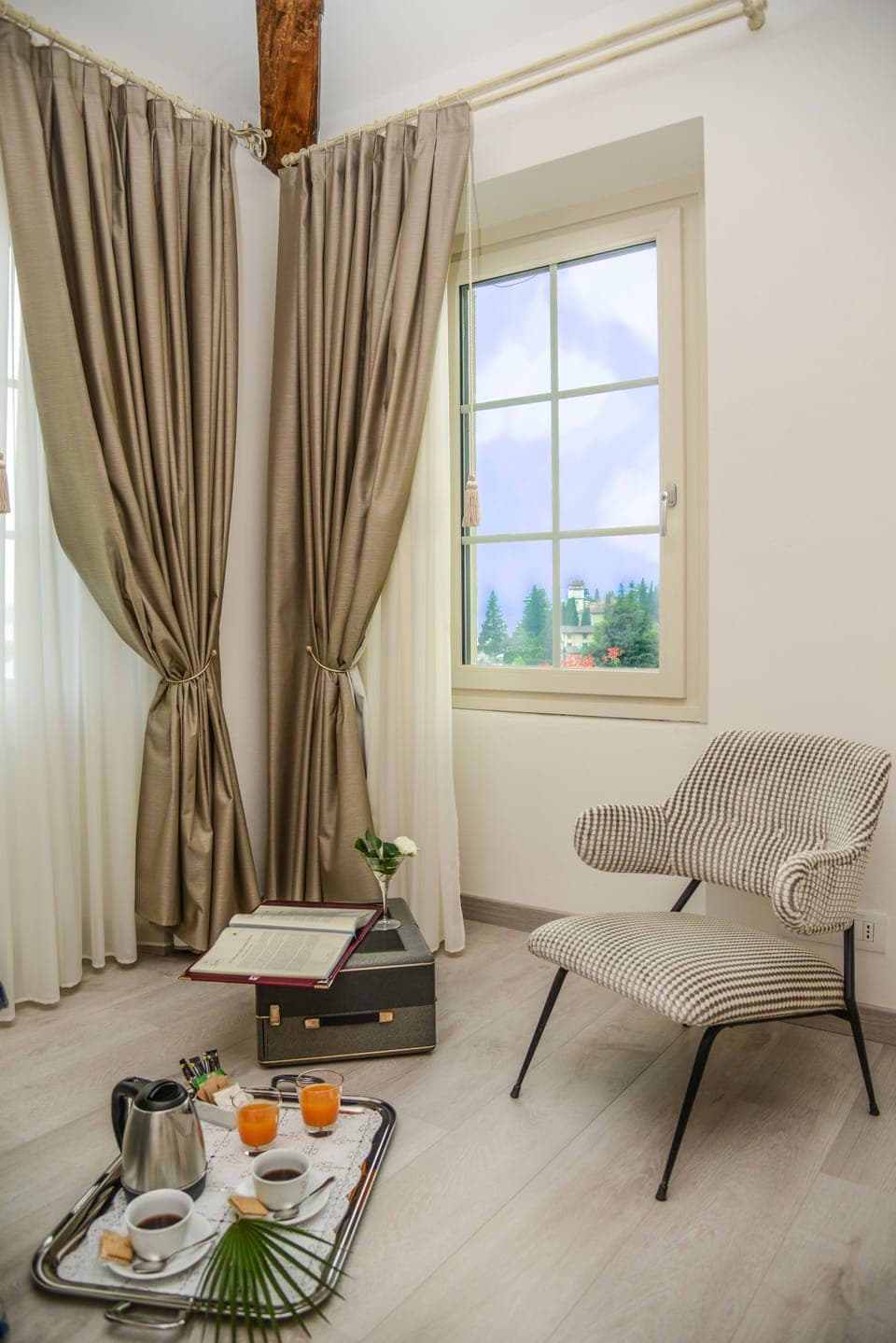 Deluxe Suite, Partial Lake View | Living room | Flat-screen TV