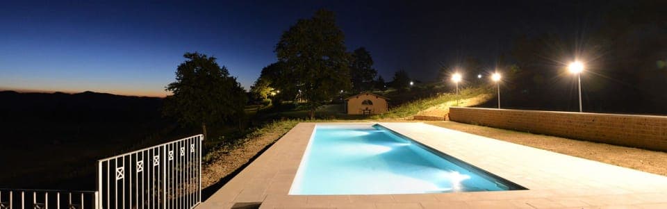 Seasonal outdoor pool, open 9:00 AM to 7:00 PM, pool umbrellas