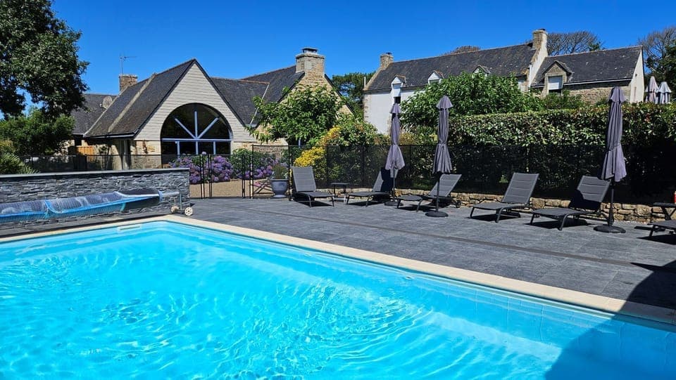 Seasonal outdoor pool, open 10:00 AM to 8:00 PM, sun loungers