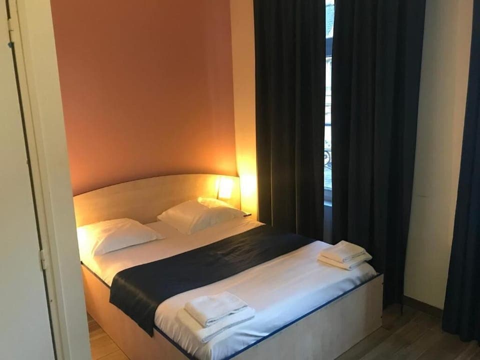 Family Room | Desk, soundproofing, iron/ironing board, rollaway beds