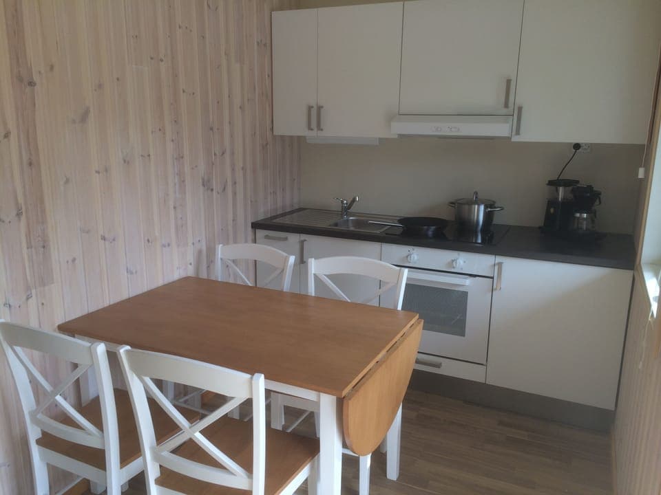 Cabin | Private kitchen | Mini-fridge, oven, stovetop, coffee/tea maker