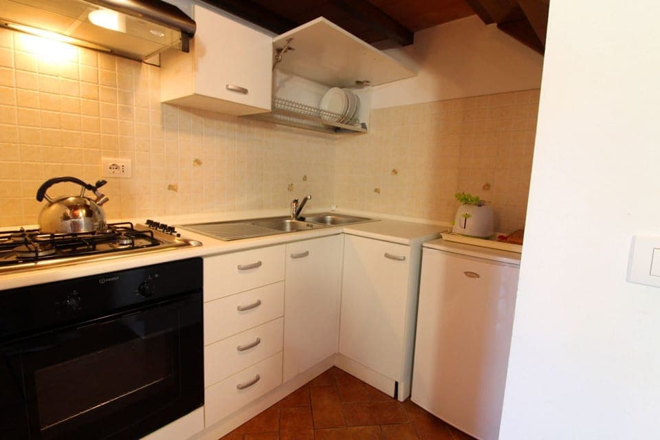 Villa, 4 Bedrooms | Private kitchen | Fridge, microwave, oven, stovetop
