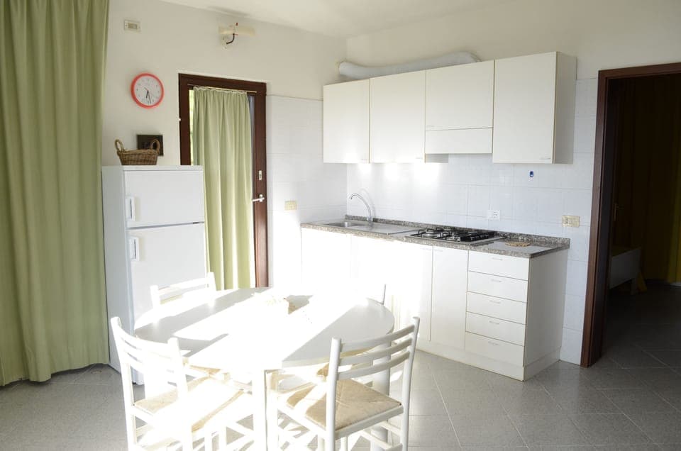 Apartment, 1 Bedroom | Private kitchenette | Fridge, stovetop, cookware/dishes/utensils