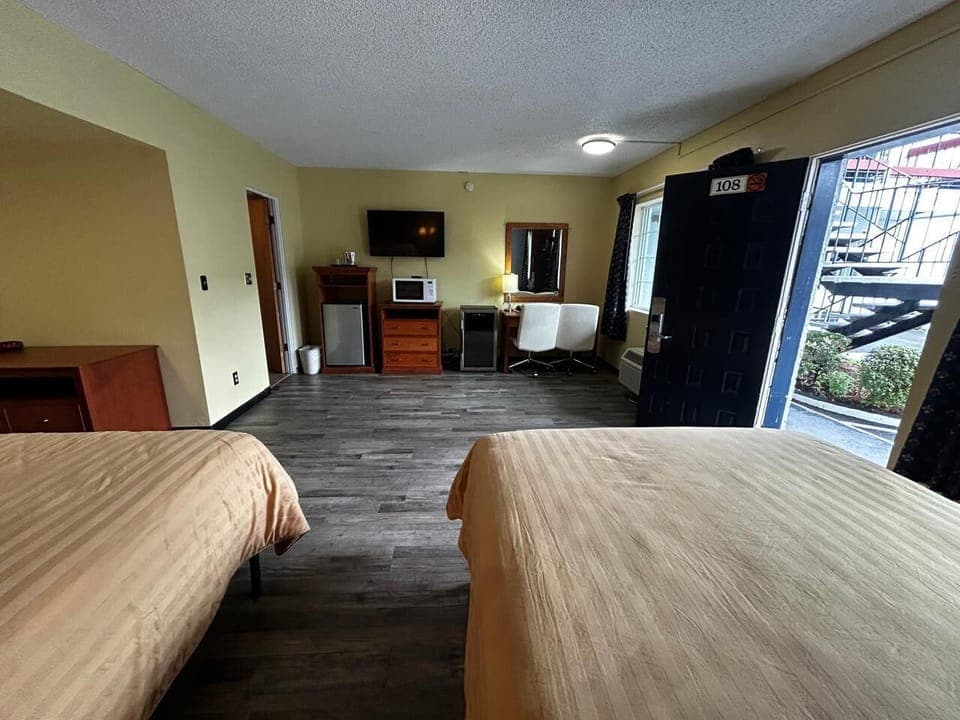 Room, 2 Queen Beds, Non Smoking | Desk, iron/ironing board, free WiFi, bed sheets