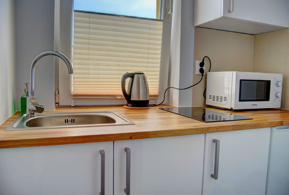 Apartment | Private kitchenette | Fridge, microwave, stovetop, electric kettle