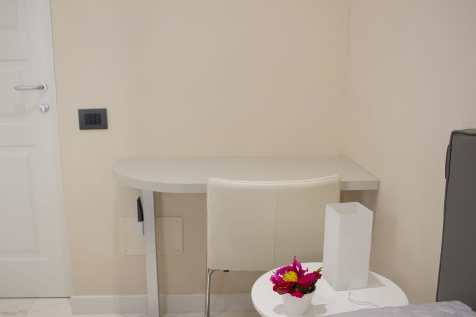 Superior Double Room, Balcony | In-room safe, desk, laptop workspace, blackout drapes