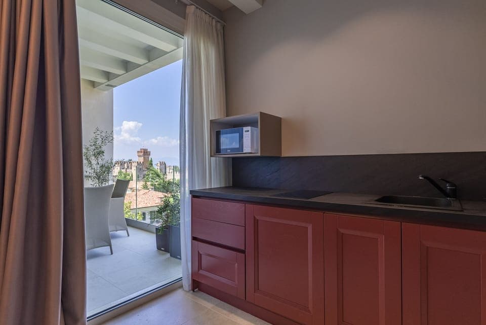 Grand Suite, 2 Bedrooms, Sauna, Partial Lake View | Private kitchen | Electric kettle