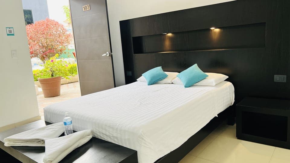 Deluxe Double Room | Desk, blackout drapes, free WiFi