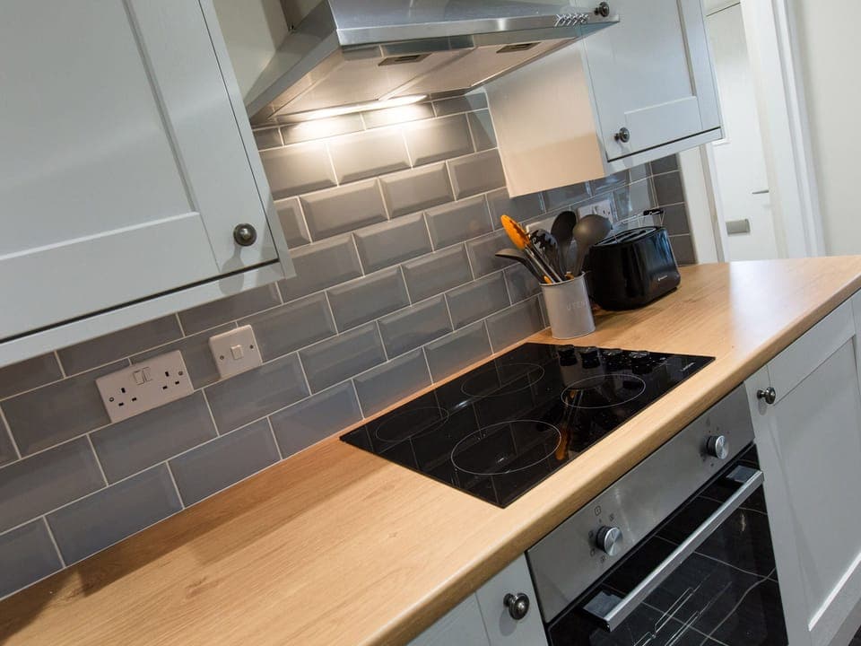 Cottage | Private kitchen | Microwave, stovetop, dishwasher, highchair