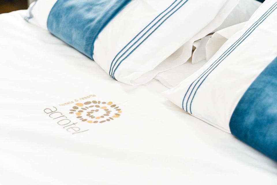 Premium bedding, desk, laptop workspace, soundproofing