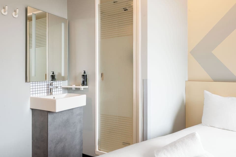 Shower, eco-friendly toiletries, hair dryer, towels