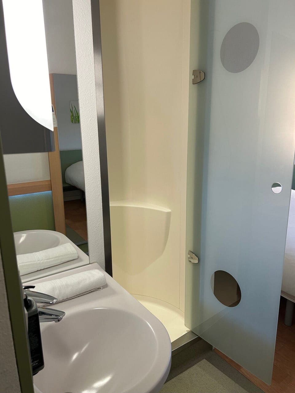 Shower, eco-friendly toiletries, hair dryer, towels