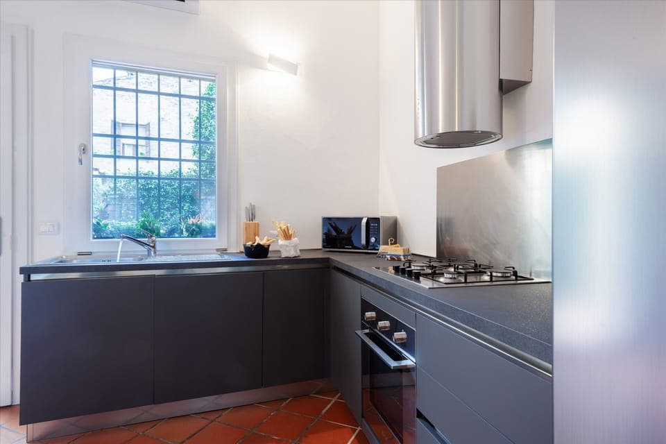 Apartment, 3 Bedrooms | Private kitchen | Full-size fridge, microwave, oven, stovetop