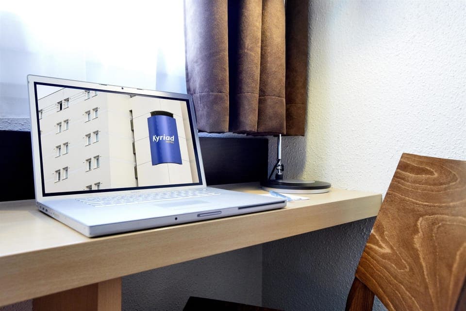 Desk, blackout drapes, soundproofing, iron/ironing board