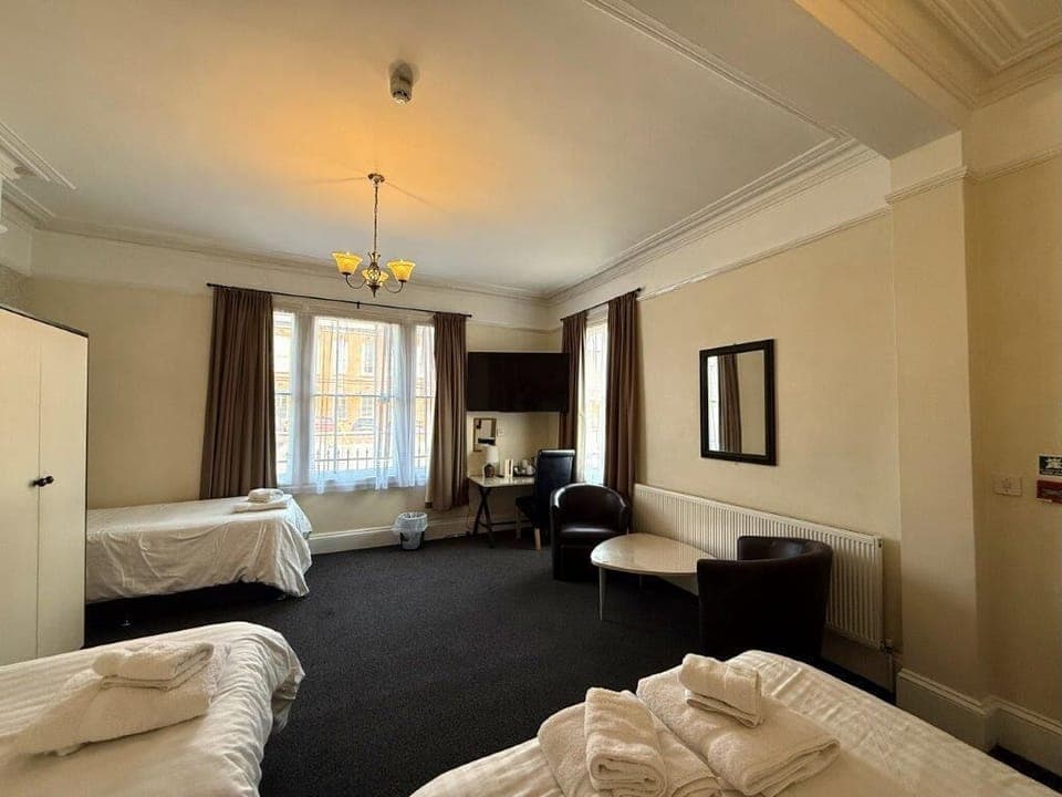 Family Room | Hypo-allergenic bedding, desk, laptop workspace, soundproofing