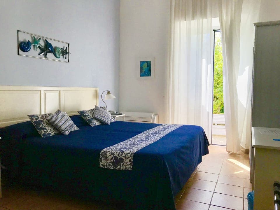 Double Room, Patio | In-room safe, individually furnished, free WiFi, bed sheets