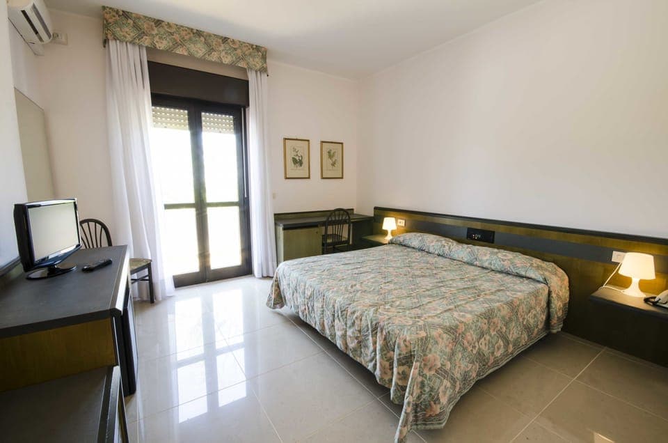 Comfort Quadruple Room, Resort View | In-room safe, desk, free WiFi, wheelchair access