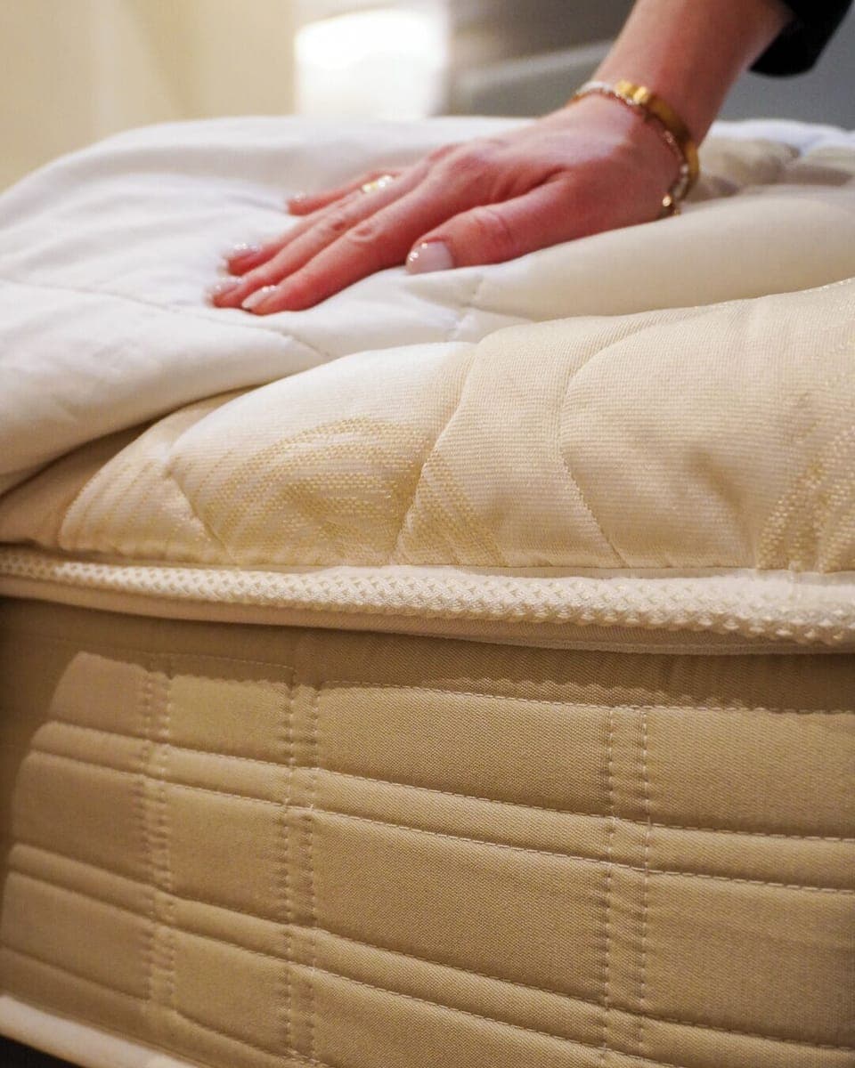 Premium bedding, down comforters, pillowtop beds, minibar