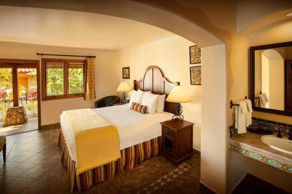 Premium bedding, pillowtop beds, blackout drapes, iron/ironing board