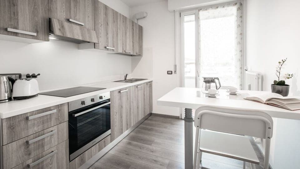 Apartment, 1 Bedroom | Private kitchen | Full-size fridge, oven, stovetop, cookware/dishes/utensils