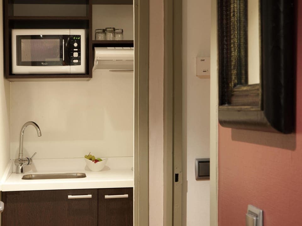 Family Apartment, 1 Bedroom | In-room safe, desk, blackout drapes, soundproofing