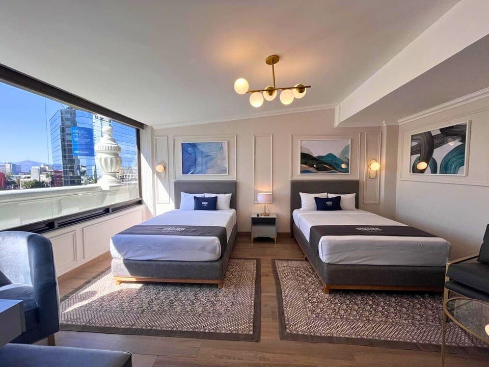 Deluxe Quadruple Room | Premium bedding, pillowtop beds, in-room safe, desk