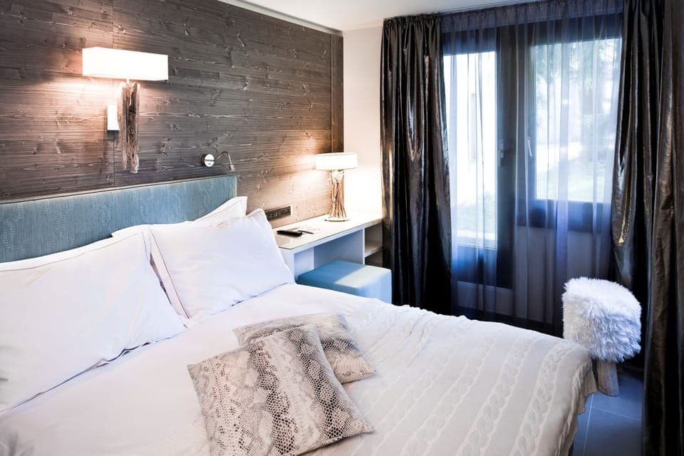 Premium bedding, down comforters, individually decorated