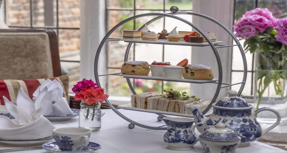 Breakfast, lunch, dinner served; British cuisine, garden views 