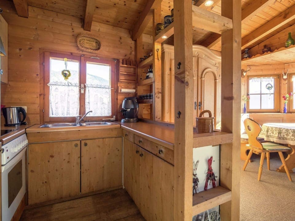 Chalet | Private kitchen | Microwave, coffee/tea maker, highchair
