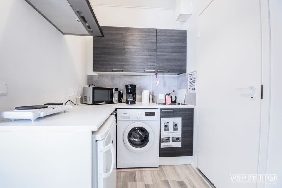 Family Apartment, Private Bathroom | Private kitchen | Shared fridge, microwave, coffee/tea maker, electric kettle
