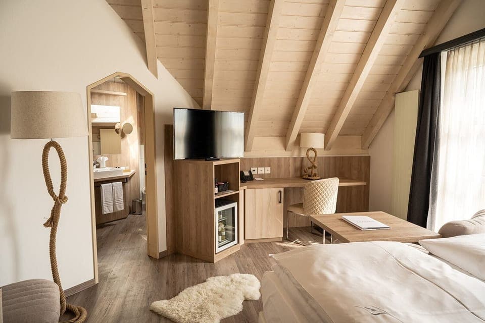 Comfort Double Room | Living area | 46-inch TV with satellite channels