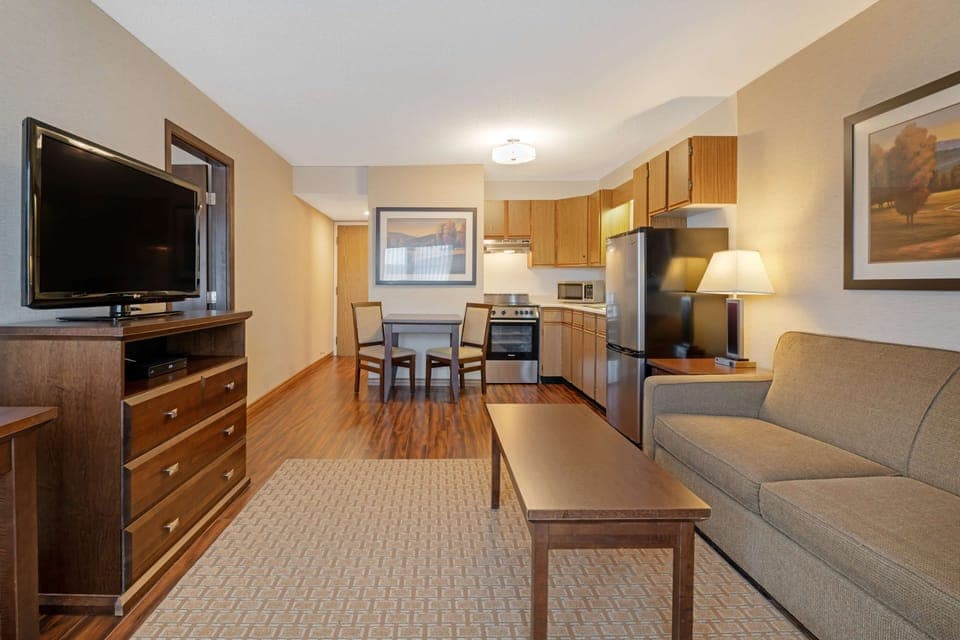 Desk, laptop workspace, iron/ironing board, free cribs/infant beds