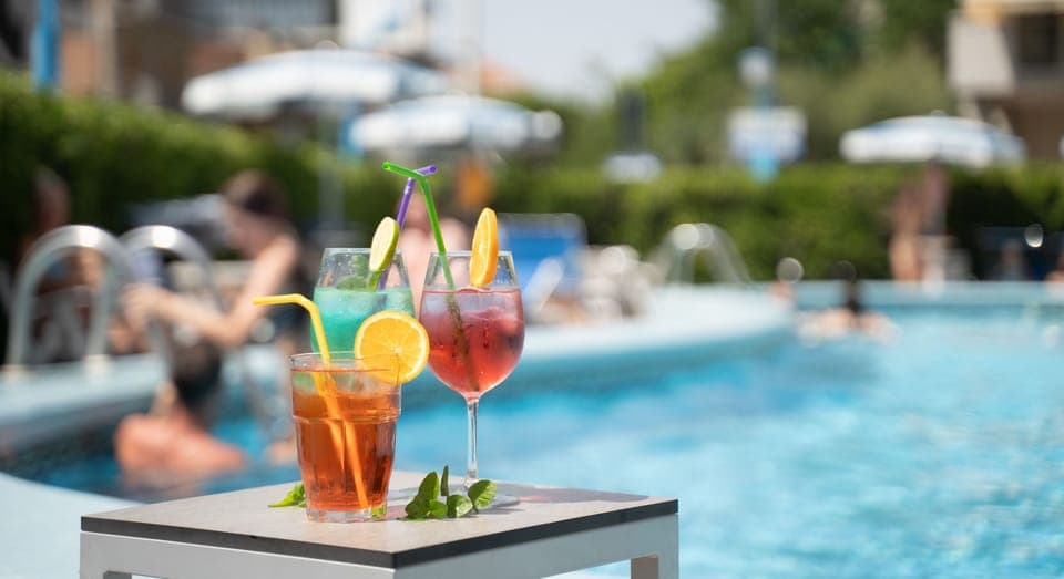 Outdoor pool, pool umbrellas, sun loungers