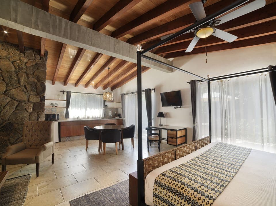 Superior Suite, 1 Queen Bed with Sofa bed, Jetted Tub | Living area | 32-inch TV with satellite channels, Netflix, streaming services