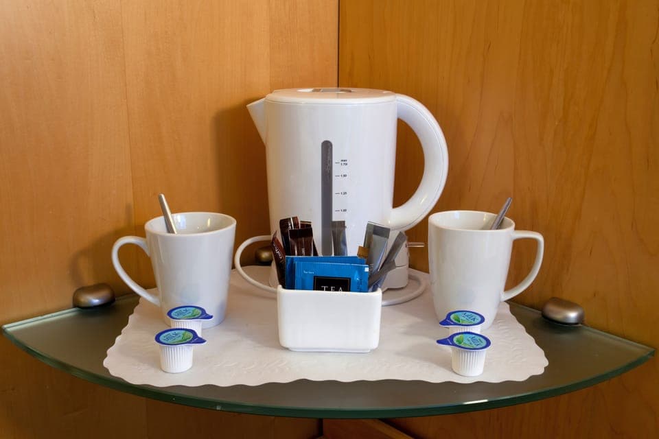 Desk, laptop workspace, free WiFi, bed sheets