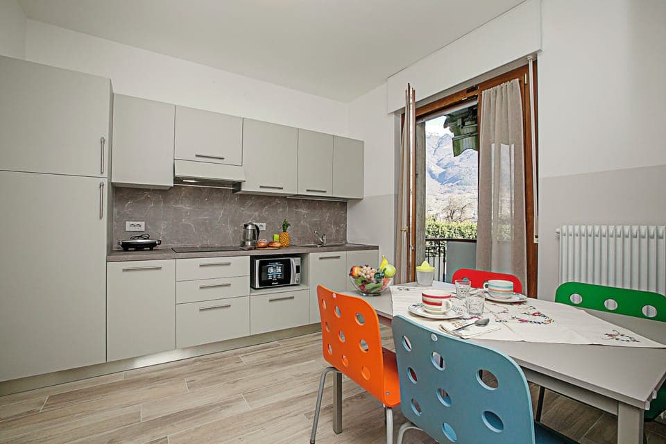 Family Apartment, Multiple Bedrooms (Bella Arco Apartment) | Private kitchen | Full-size fridge, microwave, stovetop, electric kettle