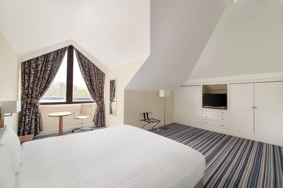 Suite, 1 King Bed with Sofa bed | In-room safe, desk, soundproofing, iron/ironing board
