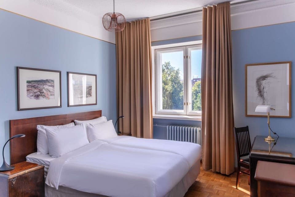 Premium bedding, memory foam beds, minibar, in-room safe