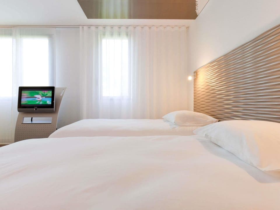 Premium bedding, Select Comfort beds, desk, blackout drapes