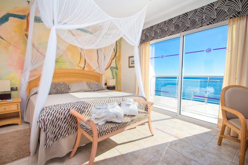 Romantic Double Room, Terrace, Sea View | Minibar, in-room safe, desk, soundproofing
