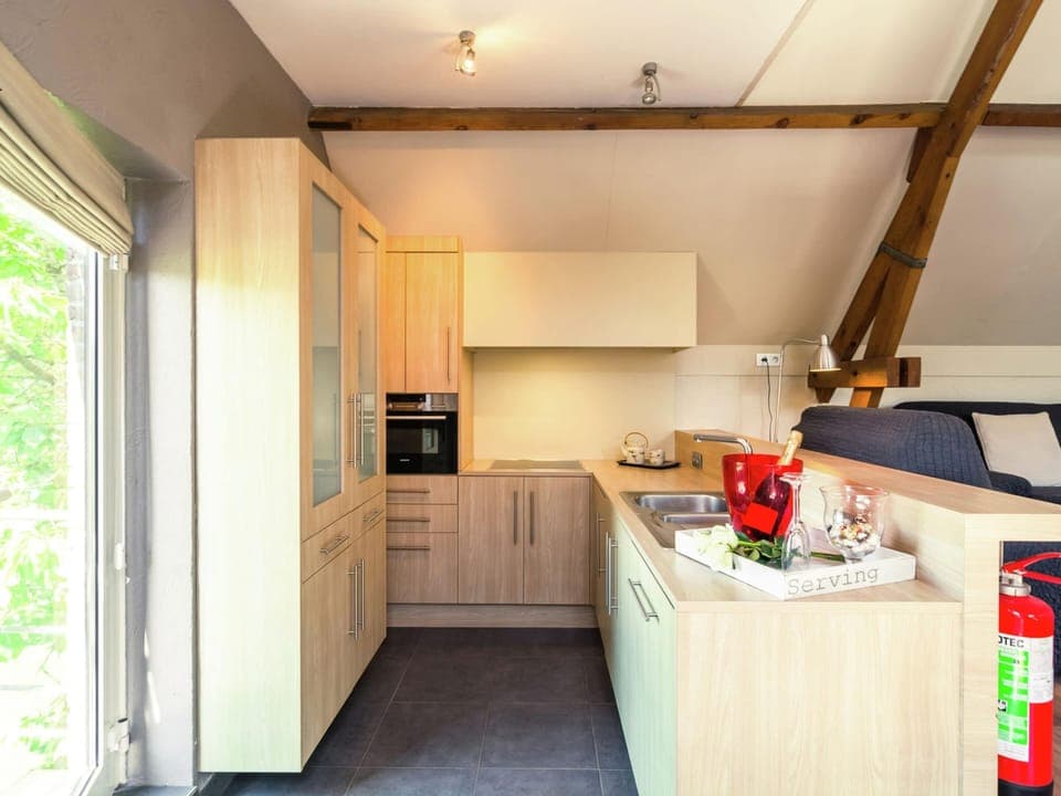 Apartment | Private kitchen | Toaster, highchair, cookware/dishes/utensils, dining tables