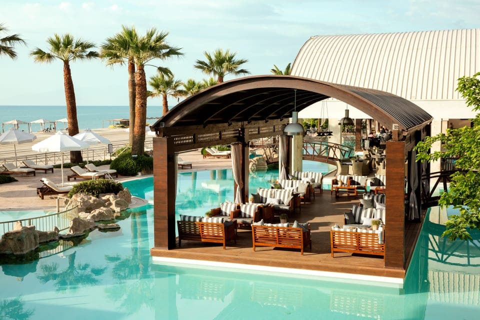 Indoor pool, seasonal outdoor pool, pool umbrellas, sun loungers